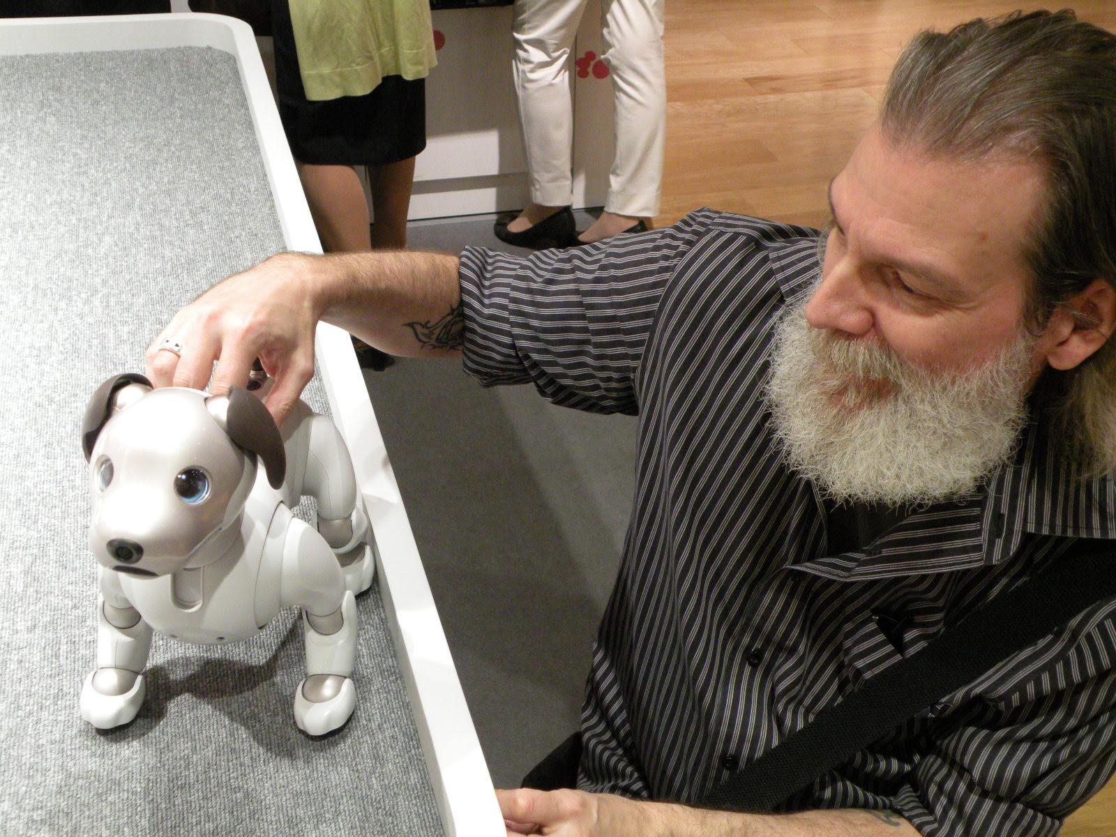 Earl petting aibo